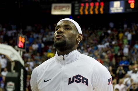 Lebron James, USA Olympic Mens Basketball player, listens to the National Anthem prior to the start of the USA versus  Dominican Republic exhibition game July 12, 2012, at the Thomas & Mack Center, Las Vegas, Nev. James is the only member of the 2012 Champion Miami Heat team on the Olympic Basketball team this year. (U.S. Air Force photo by Airman 1st Class Daniel Hughes)