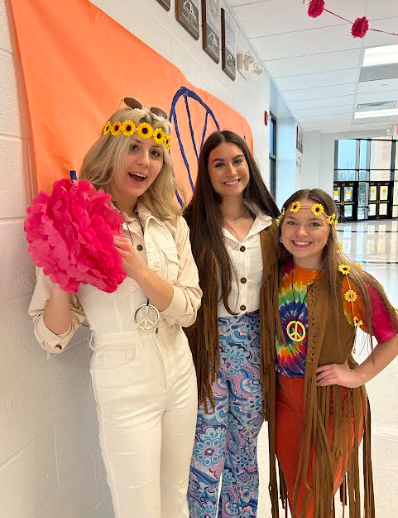 The 60s zone started with a flower power theme, led by (left to right) Anna Sites, Emma Umfleet, and Taylor Matthiesen.
