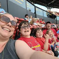 Mrs. Loughary enjoys a St Louis Cardinal game with her family