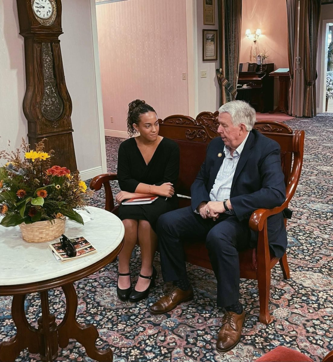 Pictured here, Junior Mady Washington (left), sits down with Missouri Governor Mike Parson (right), to discuss the 160th anniversary of the Cozean Memorial Chapel and the end of his tenure. 