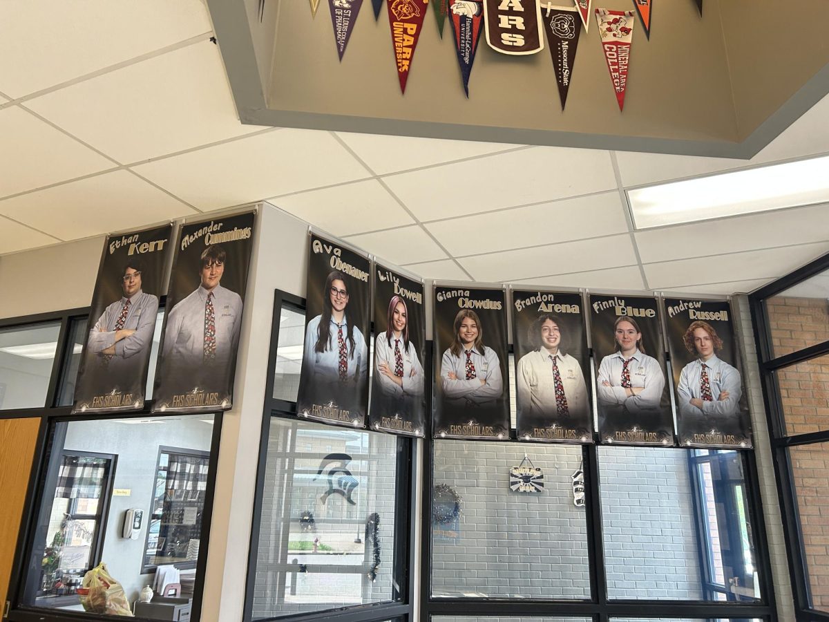 The senior banners for the Scholar Bowl team. 